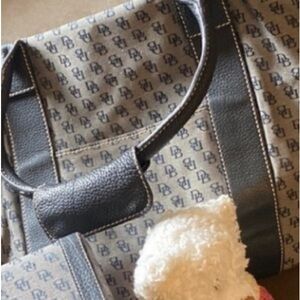 Dooney & Bourke large duffle bag and cosmetic case